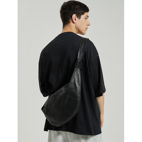 法式小衆設計師餃子包男生潮牌胸包斜後後背包可頌牛角包皮質男包大包