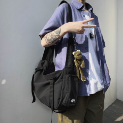 日系慵懶風斜後後背包男寬鬆大容量單肩包學生書包街頭潮流暗黑工裝包