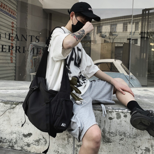 日系慵懶風斜後後背包男寬鬆大容量單肩包學生書包街頭潮流暗黑工裝包