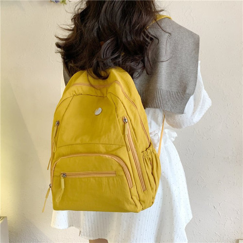 新款純色雙肩包多口袋書包初高中大學生休閒通勤旅遊輕便休閒後後背包