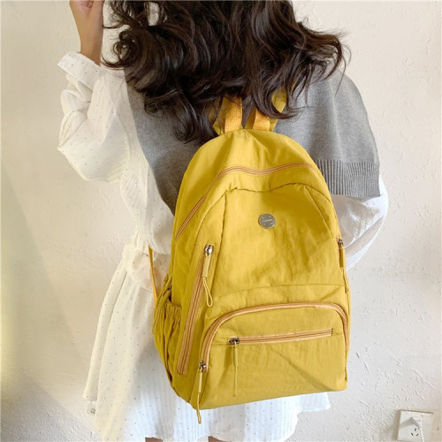 新款純色雙肩包多口袋書包初高中大學生休閒通勤旅遊輕便休閒後後背包