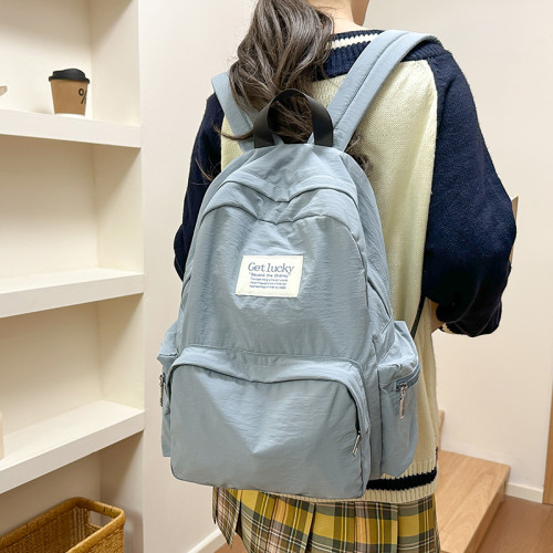 韓版初高中生森系粉色尼龍書包2026新款女大容量外出旅行雙肩後後背包