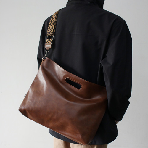 2025潮牌新款軟皮男包斜後後背包托特大包高級感運動風通勤休閒手提包