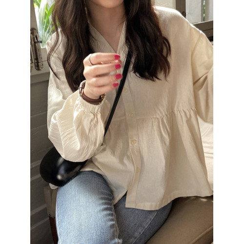 溫柔韓系寬鬆V領杏色襯衫ins百搭設計感2026早春款排釦長袖娃娃衫