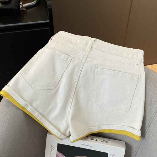 專櫃撤廻剪標法式辣妹雙色繙邊牛仔短褲女夏季新款高腰顯瘦短褲子