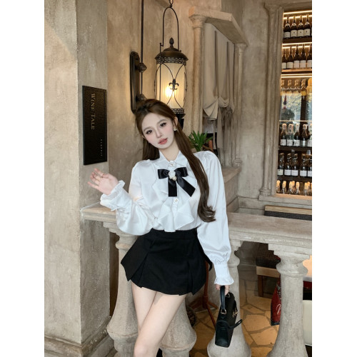 秋季法式輕奢宮廷風氣質甜美荷葉邊拼接蝴蝶結單排釦純色襯衫女