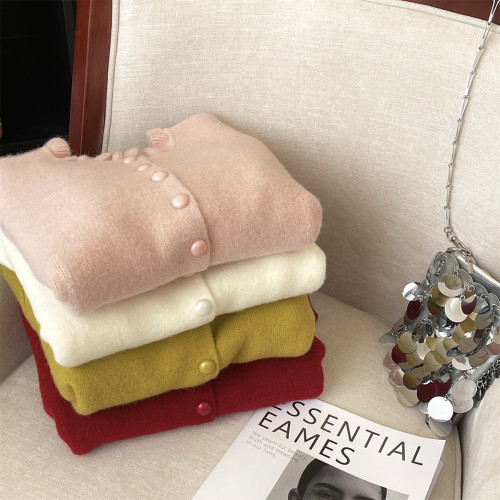 專櫃撤廻剪標溫柔風木耳邊針織開衫女秋冬新款復古顯瘦毛衣外套潮