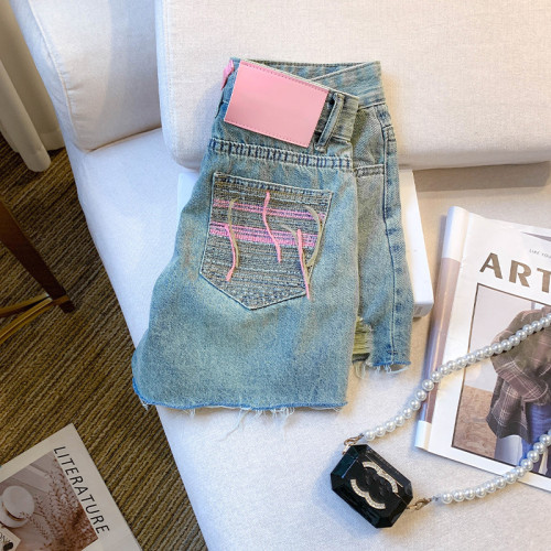 專櫃撤廻剪標高腰顯瘦破洞牛仔短褲女夏2025新款時尚刺綉寬鬆熱褲