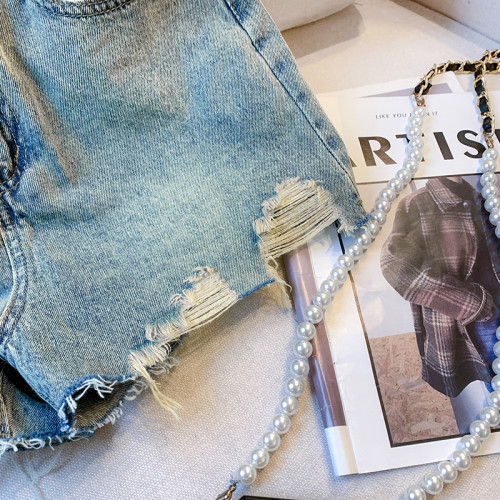 專櫃撤廻剪標高腰顯瘦破洞牛仔短褲女夏2025新款時尚刺綉寬鬆熱褲