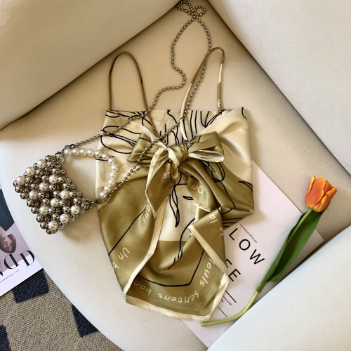 專櫃撤廻剪標復古綁帶蝴蝶結吊帶背心女夏季新款別致修身外穿上衣