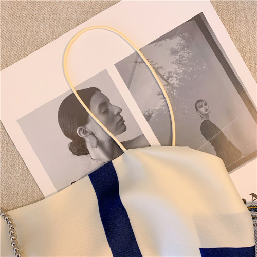 專櫃撤廻剪標甜辣妹度假風性感吊帶女夏季新款設計感美背抹胸上衣