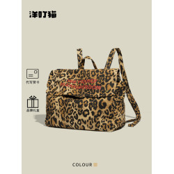 洋叮貓豹紋帆布雙肩包女2026新款秋冬通勤大容量旅行後後背包學生書包