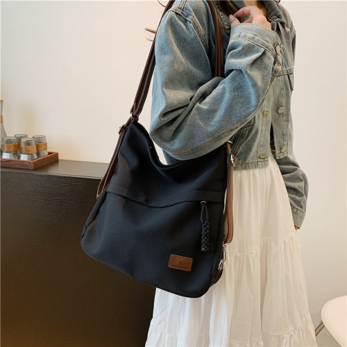 一包三用托特包後後背包女新款可雙肩單肩斜背帆布包通勤大容量多功能