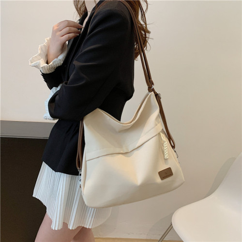 一包三用托特包後後背包女新款可雙肩單肩斜背帆布包通勤大容量多功能