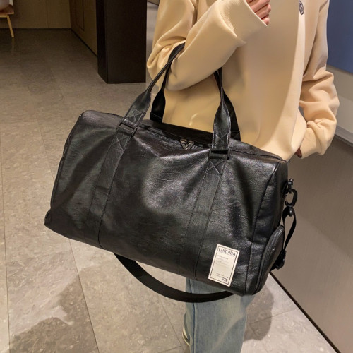 旅行包男款大容量斜背手提皮質防水行李包女高級感運動遊泳健身包