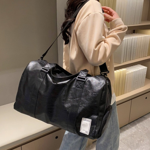 旅行包男款大容量斜背手提皮質防水行李包女高級感運動遊泳健身包