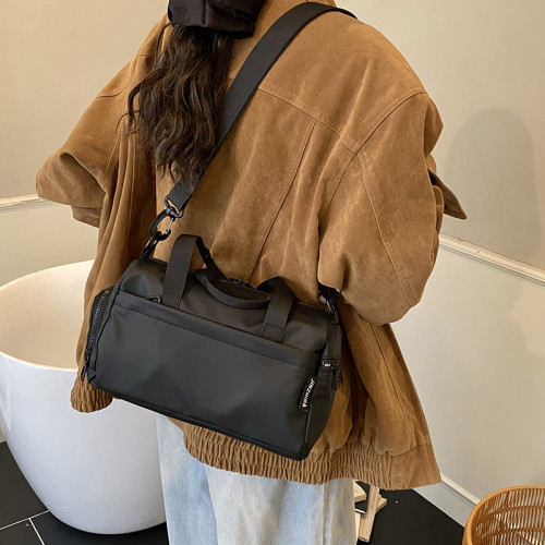 大容量防水帆布包女手提單肩斜後後背包休閒通勤健身包黑色短途旅行包