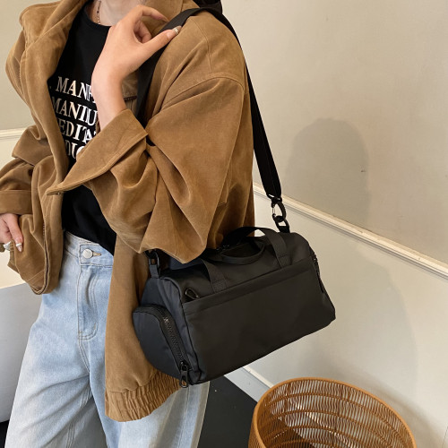 大容量防水帆布包女手提單肩斜後後背包休閒通勤健身包黑色短途旅行包