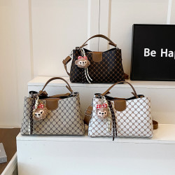 質感輕奢手提水桶包女包2025夏新款格紋百搭單肩包通勤斜後後背包