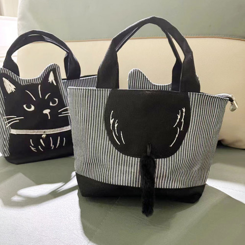 新款刺綉黑色貓咪大容量手提包通勤布藝逛街手拎包卡通胖貓百搭包