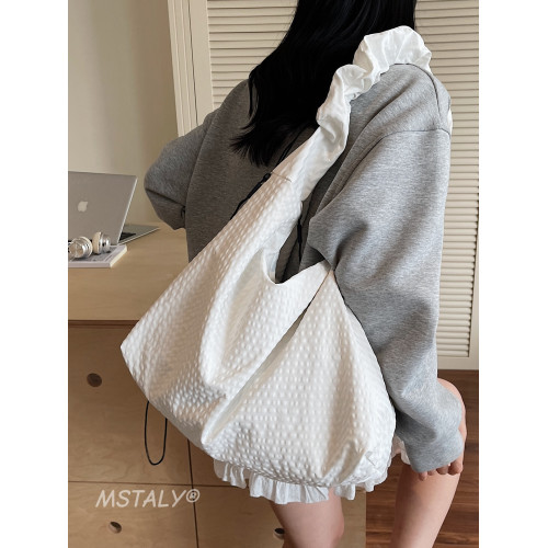 韓版ins時尚褶皺帆布包包女2026新款輕便托特包上課大容量斜後後背包