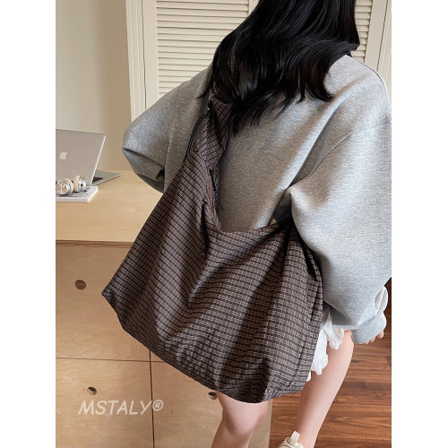 韓版ins時尚褶皺帆布包包女2026新款輕便托特包上課大容量斜後後背包