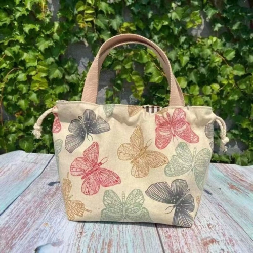 上班族出門通勤小拎包百搭手提雜物袋可愛2022女款輕便帆布便當包