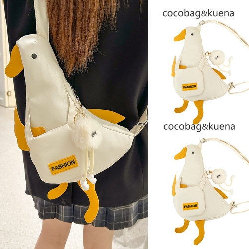 夏天夏季稀奇古怪可愛小鴨子手機包包女2026新款帆布胸包斜背後後背包