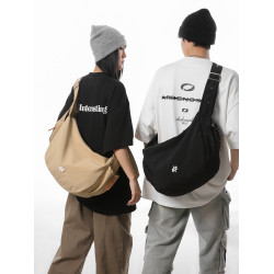 花兒與少年同款原創運動斜後後背包男女旅行包單肩餃子包女大學生後後背包