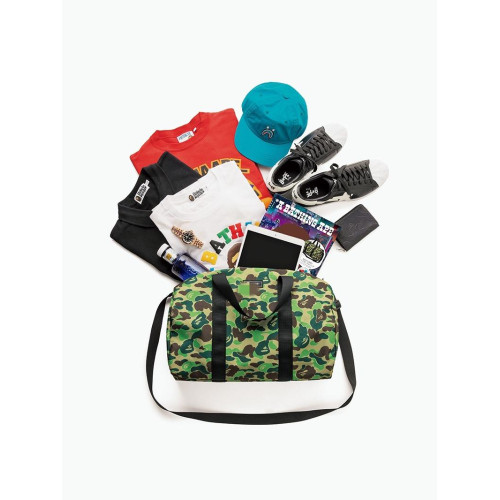 原單BAPE日雜附錄猿人頭迷彩防水圓筒大容量斜後後背包旅行手提運動包