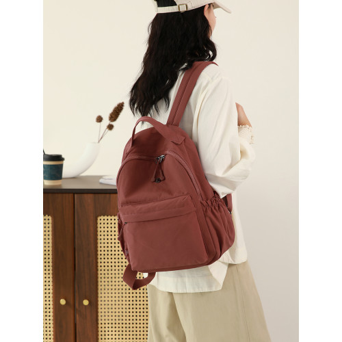 牛津布雙肩包女2026新款時尚輕便旅遊書包男旅行女士防水通勤後後背包