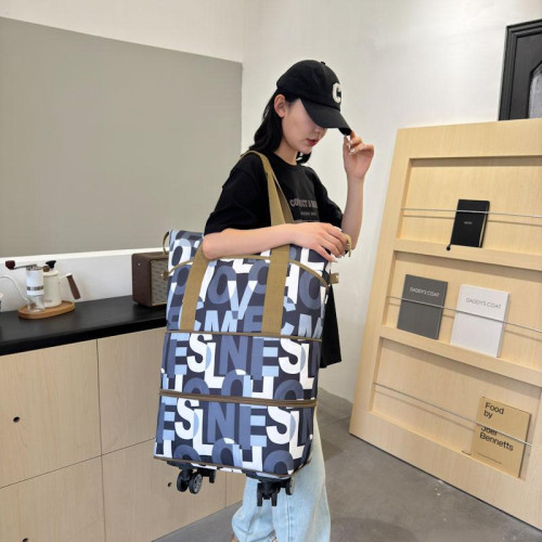 時尚旅行包萬向輪短途行李包手提出差大容量輕便收納包待産行李袋