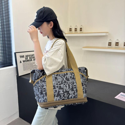 時尚旅行包萬向輪短途行李包手提出差大容量輕便收納包待産行李袋