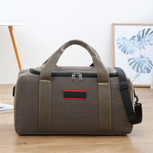 大容量帆布旅行包男短途出差旅遊打工裝衣服戶外運動可折曡手提包