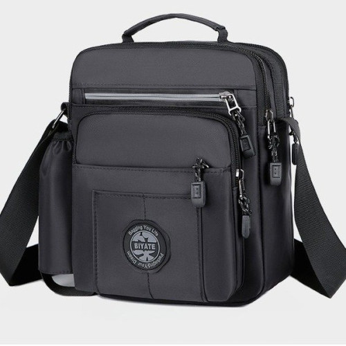 新款男士竪版單肩斜後後背包休閒男包多功能潮流手提包防水牛津布包