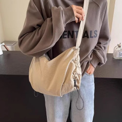 日系尼龍餃子包運動斜後後背包包女2025新款大容量騎行松弛感單肩包