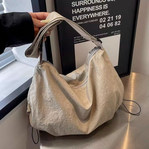 日系尼龍餃子包運動斜後後背包包女2025新款大容量騎行松弛感單肩包 日系尼龍餃子包運動斜後後背包包女2025新款大容量騎行松弛感單肩包