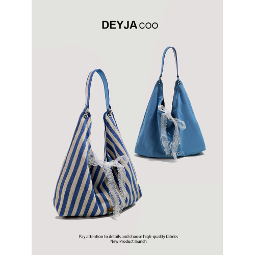 夏天條紋帆布包包女2025新款韓系通勤托特包慵懶風字母雙面單肩包