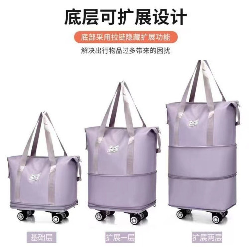 萬向輪旅行包2024年新款可攜式手拉行李袋帶滑輪收納包大容量健身包