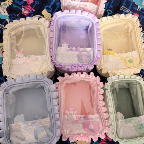 日單新款蕾絲透明娃娃痛包收納包可愛通勤玩偶包女孩收納包彩妝包