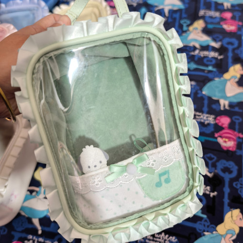 日單新款蕾絲透明娃娃痛包收納包可愛通勤玩偶包女孩收納包彩妝包