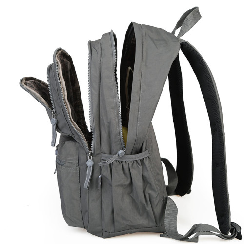 大容量戶外防水帆布雙肩包男輕量電腦雙肩後後背包女多口袋大學生書包