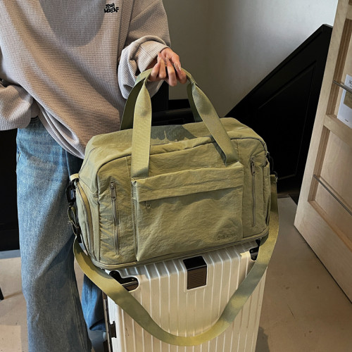 輕便旅行包女士大容量手提包防水短途出差行李包男百搭單肩旅遊包