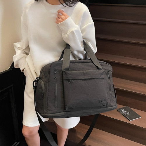 輕便旅行包女士大容量手提包防水短途出差行李包男百搭單肩旅遊包