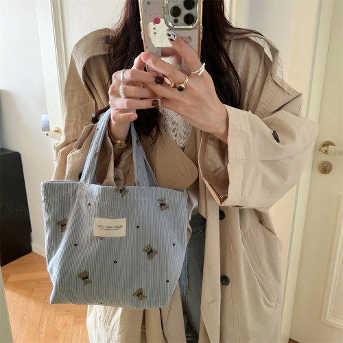 秋冬新款手提小號學生女通勤零食手機雜物收納燈芯絨帆布袋手拎包