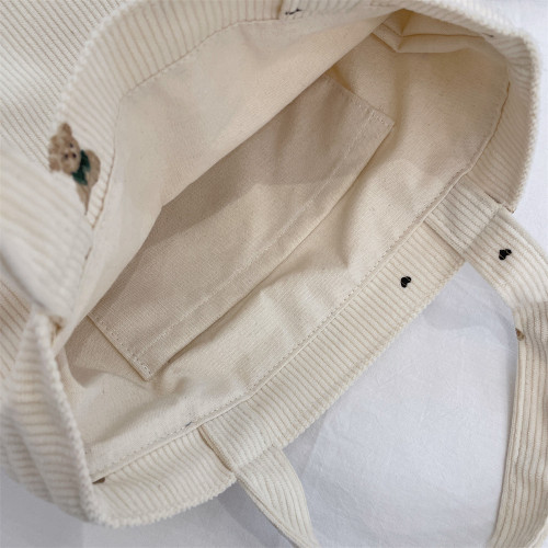 秋冬新款手提小號學生女通勤零食手機雜物收納燈芯絨帆布袋手拎包