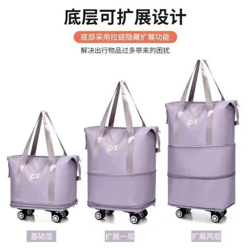 萬向輪旅行包2024年新款可攜式手拉行李袋帶滑輪收納包大容量健身包