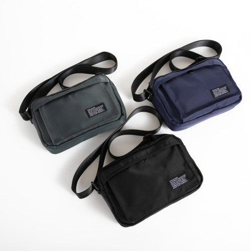 日系小挎包男休閒手機包街頭潮流韓版單肩包牛津布簡約ins斜後後背包