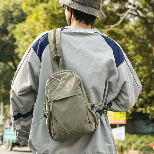 雙肩包男休閒百搭胸包輕便登山小後後背包多功能單肩斜後後背包通勤書包女