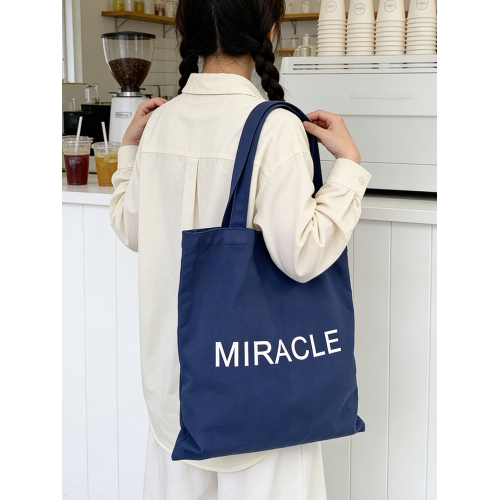 藏藍色字母帆布包女大容量單肩包手提托特包通勤包學生補習裝書包